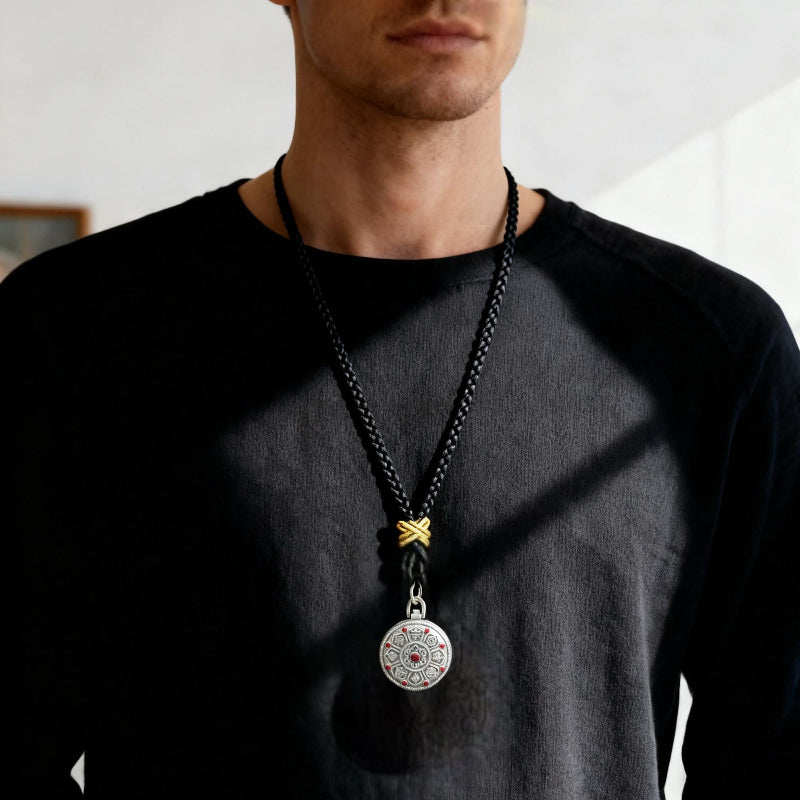 Original Design Eight Auspicious Symbols Kalu Box Pendant, paired with a hand-woven adjustable Perfect Peace necklace.